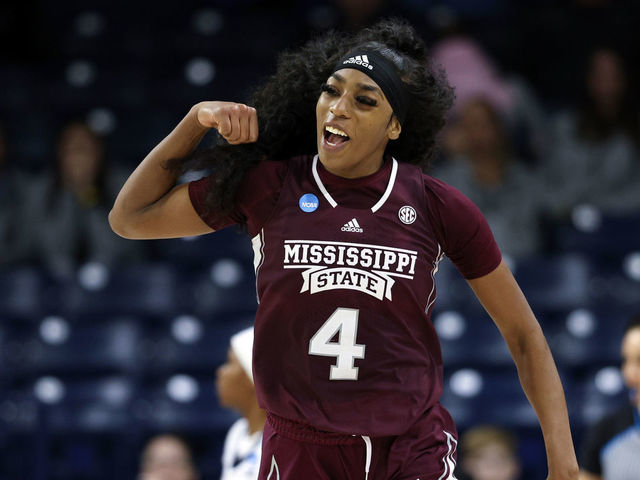 SOUTH BEND, IN - MARCH 15: Jessika Carter #4 of the Mississippi State Bulldogs celebrates on the court after scoring some points against the Illinois Fighting Illini during the First Four round of the 2023 NCAA Women's Basketball Tournament held at Purcell Pavilion on March 15, 2023 in South Bend, Indiana.