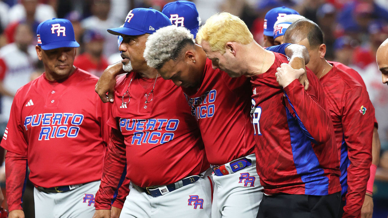 MIAMI, FLORIDA - MARCH 15: Edwin Diaz #39 of Team Puerto Rico is carried off the field after sustaining an injury while celebrating a 5-2 win against Team Dominican Republic during their World Baseball Classic Pool D game at loanDepot park on March 15, 2023 in Miami, Florida.