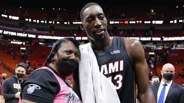 MIAMI, FLORIDA - OCTOBER 29: Bam Adebayo #13 of the Miami Heat poses for a photo with his mother, Marilyn Blount, after the game against the Charlotte Hornets at FTX Arena on October 29, 2021 in Miami, Florida.