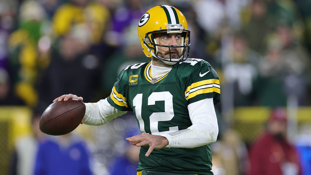 GREEN BAY, WISCONSIN - JANUARY 01: Aaron Rodgers #12 of the Green Bay Packers looks to pass during a game against the Minnesota Vikings at Lambeau Field on January 01, 2023 in Green Bay, Wisconsin. The Packers defeated the Vikings 41-17.