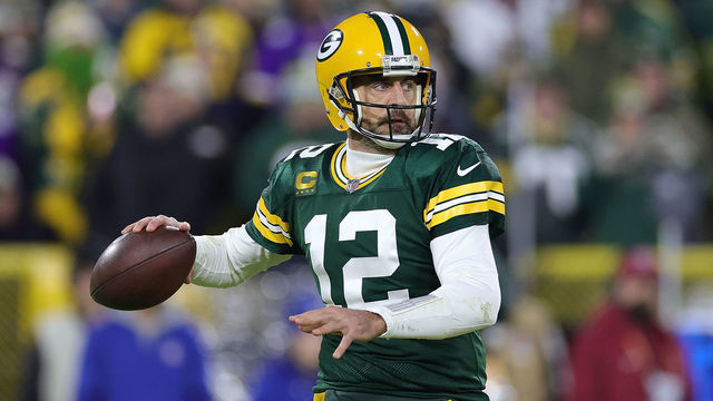 GREEN BAY, WISCONSIN - JANUARY 01: Aaron Rodgers #12 of the Green Bay Packers looks to pass during a game against the Minnesota Vikings at Lambeau Field on January 01, 2023 in Green Bay, Wisconsin. The Packers defeated the Vikings 41-17.
