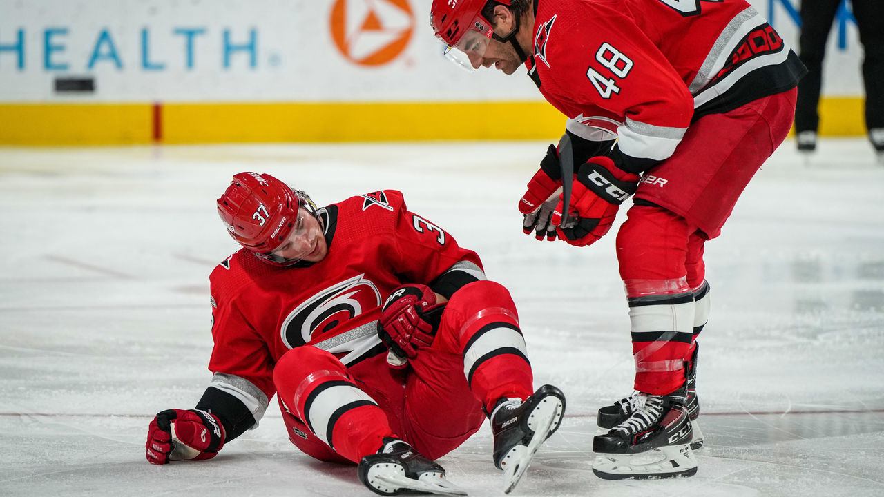 RALEIGH, NORTH CAROLINA - MARCH 09: Andrei Svechnikov #37 of the Carolina Hurricanes reacts after suffering an injury during the second period against the Philadelphia Flyers at PNC Arena on March 09, 2023 in Raleigh, North Carolina.