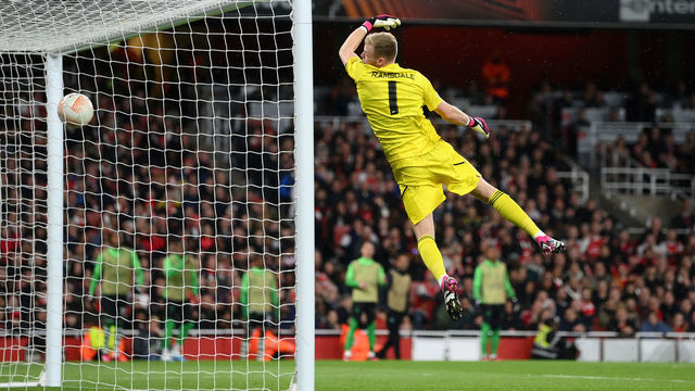 LONDON, ENGLAND - MARCH 16: Aaron Ramsdale of Arsenal fails to save a shot from Pedro Goncalves of Sporting CP (not pictured) as he scores their side's first goal during the UEFA Europa League round of 16 leg two match between Arsenal FC and Sporting CP at Emirates Stadium on March 16, 2023 in London, England.