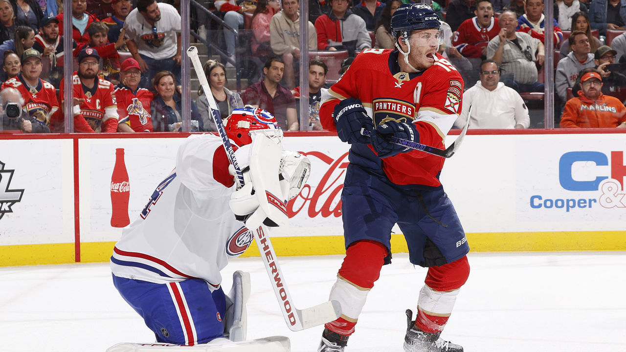 SUNRISE, FL - MARCH 16: Matthew Tkachuk #19 of the Florida Panthers attempts to tip the puck past Goaltender Jake Allen #34 of the Montreal Canadiens during first period action at the FLA Live Arena on March 16, 2023 in Sunrise, Florida.