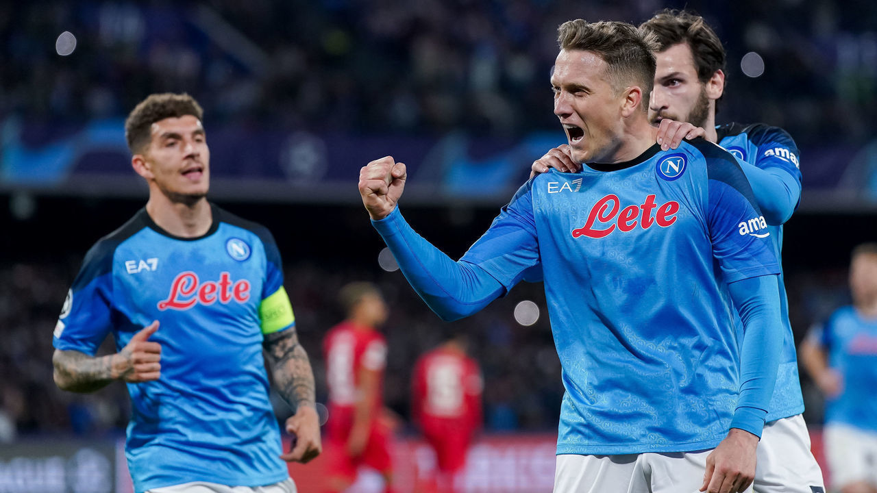 Piotr Zielinski of SSC Napoli celebrates after scoring third goal during the UEFA Champions League match round of 16 leg Two between SSC Napoli and Eintracht Frankfurt at Stadio Diego Armando Maradona on March 15, 2023 in Naples, Italy.