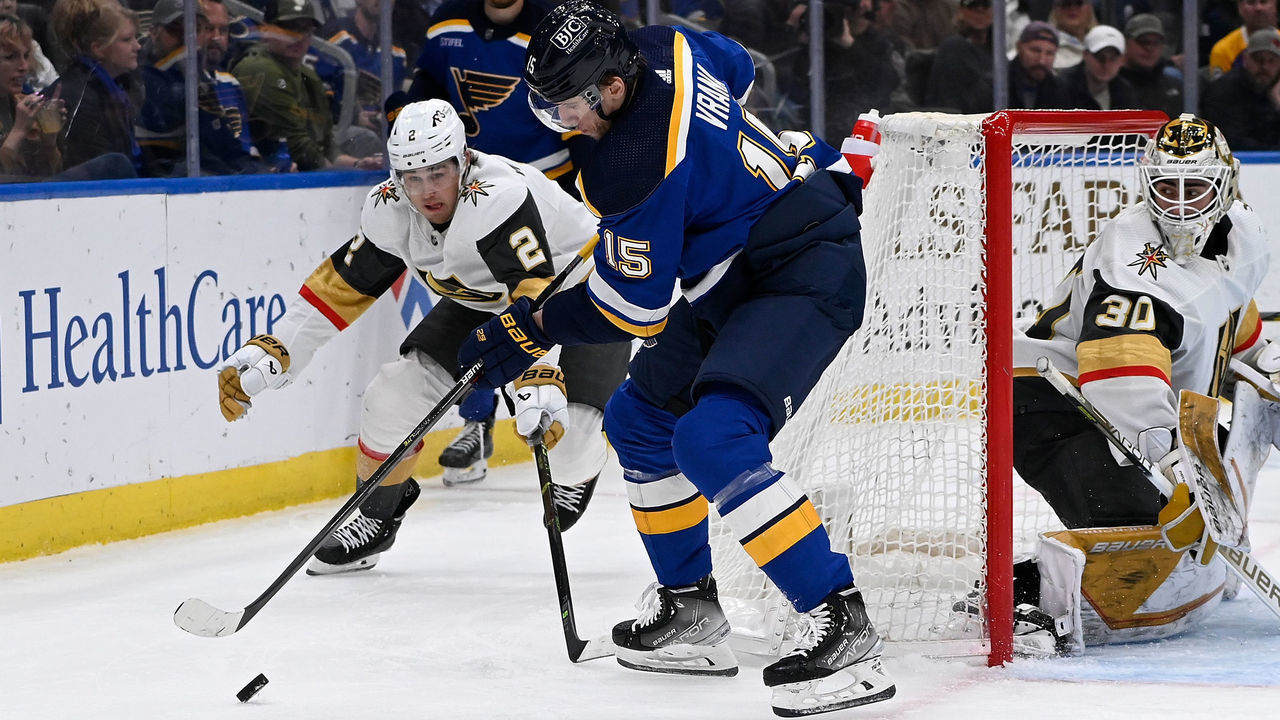 ST. LOUIS, MO - MARCH 12: Zach Whitecloud #2 of the Vegas Golden Knights defends against Jakub Vrana #15 of the St. Louis Blues at the Enterprise Center on March 12, 2023 in St. Louis, Missouri.