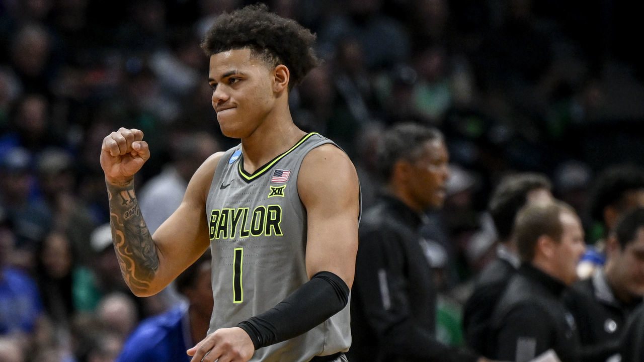 DENVER, CO - MARCH 17: Keyonte George (1) of the Baylor Bears pumps his fist as the Bears take control of the UC Santa Barbara Gauchos during the second half of Baylors 74-56 win in the first round NCAA mens basketball tournament at Ball Arena in Denver on Friday, March 17, 2023.