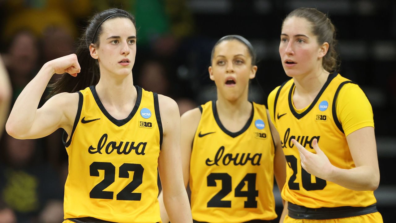 IOWA CITY, IA - MARCH 17: Caitlin Clark #22, Gabbie Marshall #24 and Kate Martin #20, all of the Iowa Hawkeyes, take a breather in the first half against the Southeastern Louisiana Lions during the first round of the 2023 NCAA Women's Basketball Tournament held at Carver-Hawkeye Arena on March 17, 2023 in Iowa City, Iowa.