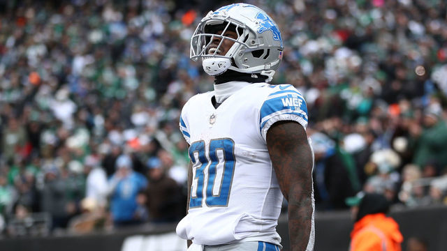 EAST RUTHERFORD, NEW JERSEY - DECEMBER 18: Jamaal Williams #30 of the Detroit Lions celebrates a run that was called back by a penalty during the first half against the New York Jets at MetLife Stadium on December 18, 2022 in East Rutherford, New Jersey.