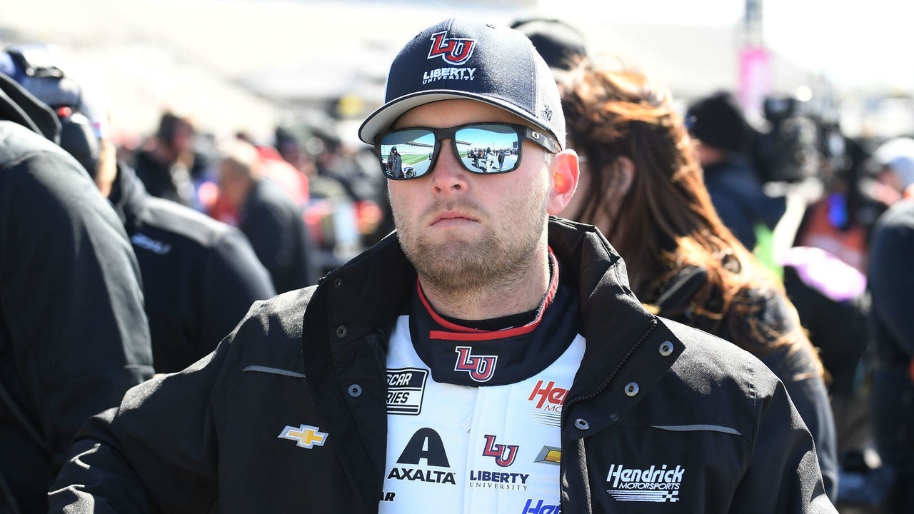 ATLANTA, GA - MARCH 18: William Byron (#24 Hendrick Motorsports Liberty University Chevrolet) looks on during qualifying for the NASCAR Cup Series Ambetter Health 400 on March 18, 2023, at Atlanta Motor Speedway in Hampton, GA.