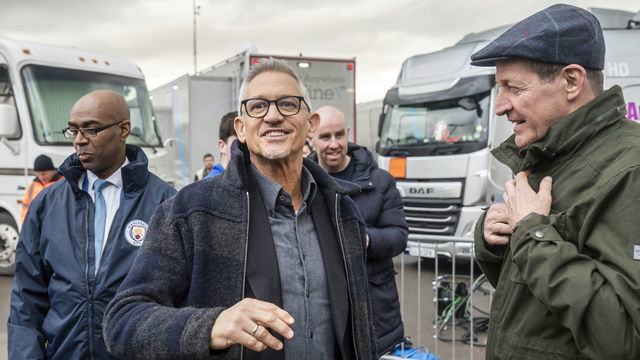 Gary Lineker (centre) speaks to Alastair Campbell as he arrives at the Etihad Stadium in Manchester to present live coverage of the FA Cup quarter-final between Manchester City and Burnley on the BBC, following a row which was sparked after he was taken off air for a tweet comparing the language used to launch a new Government asylum seeker policy to that of 1930s Germany. Picture date: Saturday March 18, 2023.
