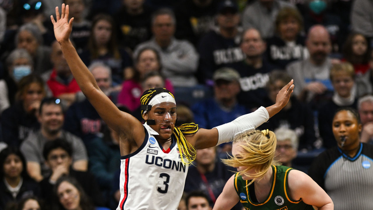 STORRS, CT - MARCH 18: Aaliyah Edwards #3 of the University of Connecticut Huskies defends Marissa McDonald #22 of the University of Vermont Catamounts during the first round of the 2023 NCAA Women's Basketball Tournament held at Gampel Pavilion on March 18, 2023 in Storrs, Connecticut.