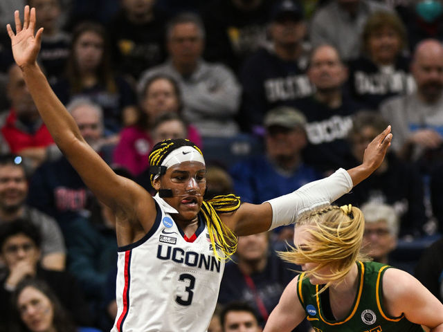 STORRS, CT - MARCH 18: Aaliyah Edwards #3 of the University of Connecticut Huskies defends Marissa McDonald #22 of the University of Vermont Catamounts during the first round of the 2023 NCAA Women's Basketball Tournament held at Gampel Pavilion on March 18, 2023 in Storrs, Connecticut.