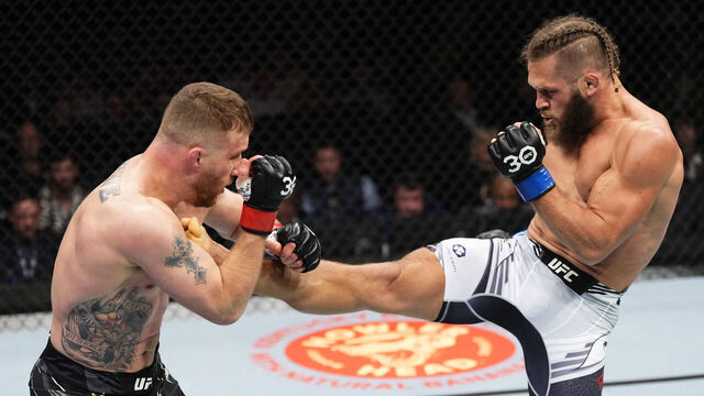 LONDON, ENGLAND - MARCH 18: (R-L) Rafael Fiziev of Kazakstan kicks Justin Gaethje in a lightweight fight during the UFC 286 event at The O2 Arena on March 18, 2023 in London, England.