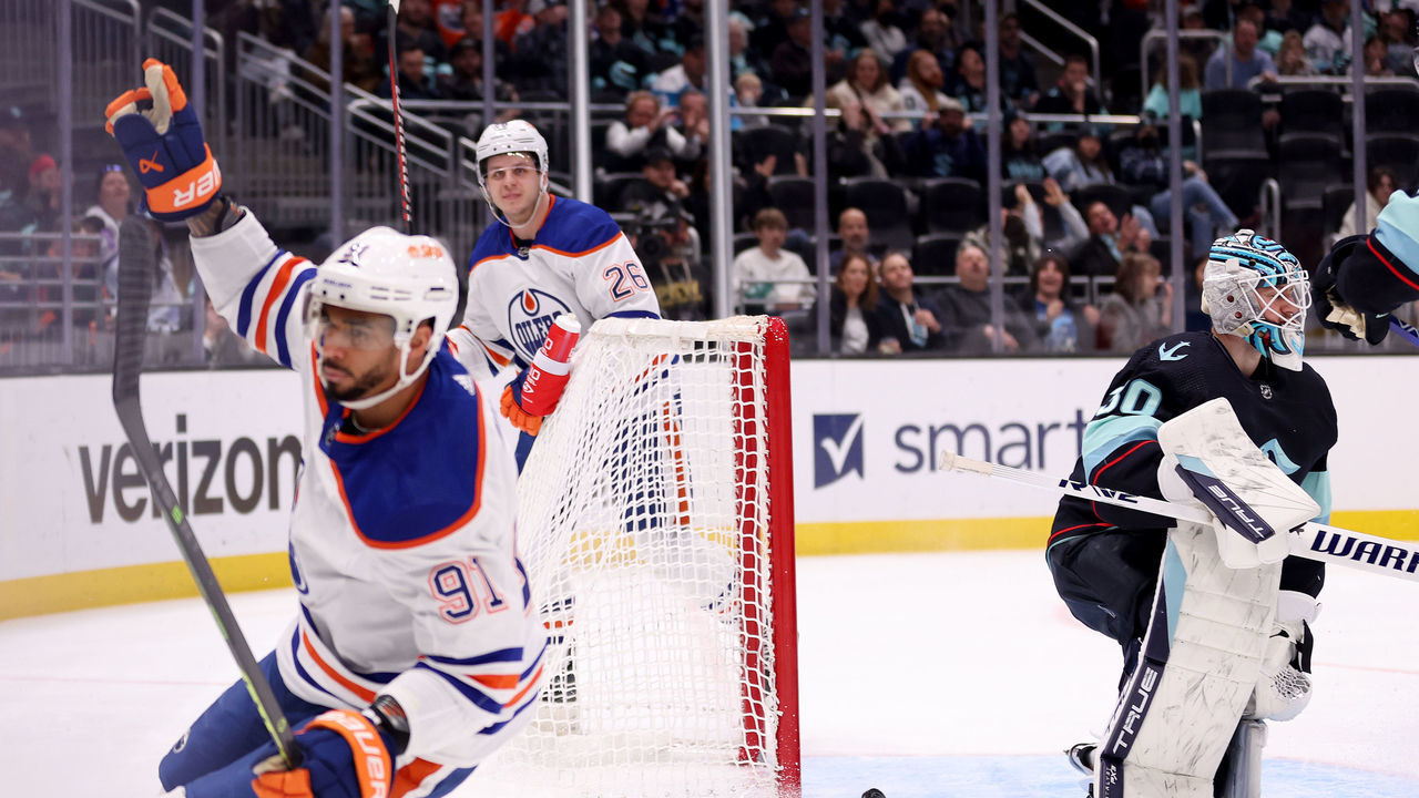 SEATTLE, WASHINGTON - MARCH 18: Martin Jones #30 of the Seattle Kraken reacts after a hat trick by Evander Kane #91 of the Edmonton Oilers during the third period at Climate Pledge Arena on March 18, 2023 in Seattle, Washington.