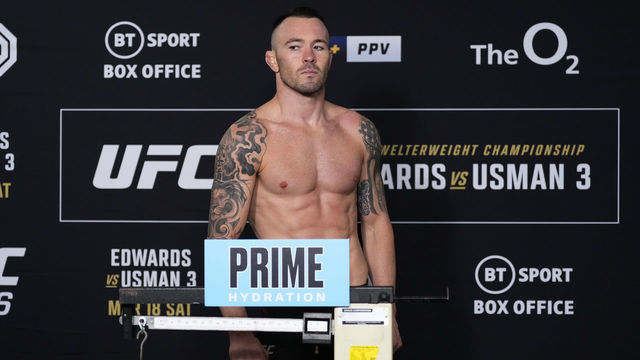 LONDON, ENGLAND - MARCH 17: Colby Covington poses on the scale during the UFC 286 official weigh-in at Hilton London Canary Wharf on March 17, 2023 in London, England.