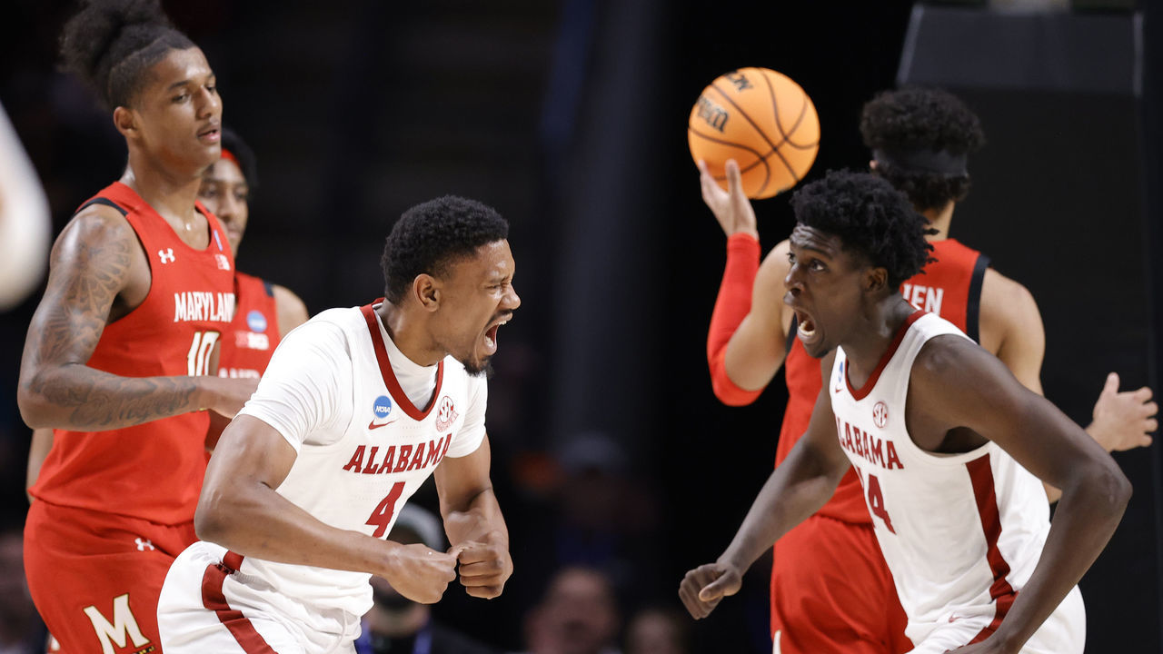 BIRMINGHAM, ALABAMA - MARCH 18: Noah Gurley #4 of the Alabama Crimson Tide and Charles Bediako #14 react during the second half against the Maryland Terrapins in the second round of the NCAA Men's Basketball Tournament at Legacy Arena at the BJCC on March 18, 2023 in Birmingham, Alabama.