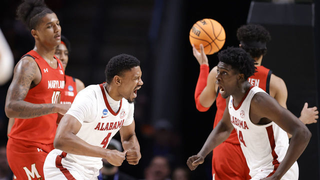 BIRMINGHAM, ALABAMA - MARCH 18: Noah Gurley #4 of the Alabama Crimson Tide and Charles Bediako #14 react during the second half against the Maryland Terrapins in the second round of the NCAA Men's Basketball Tournament at Legacy Arena at the BJCC on March 18, 2023 in Birmingham, Alabama.