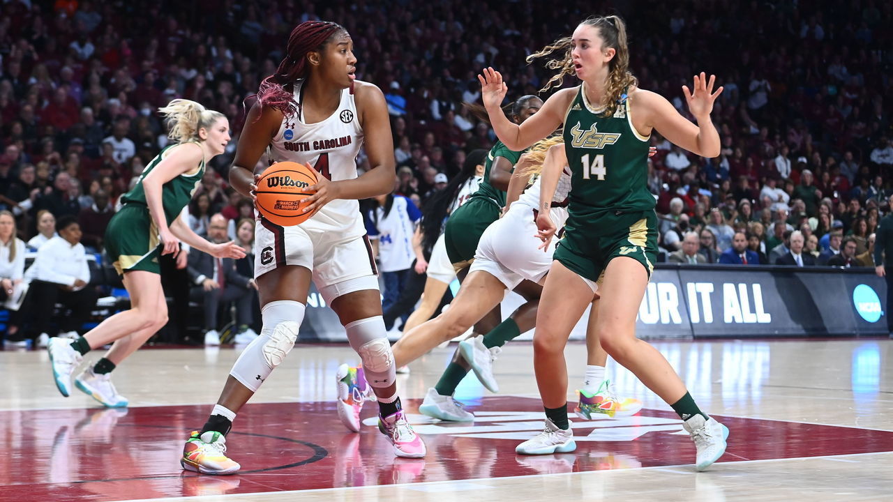 COLUMBIA, SC - MARCH 19: Aliyah Boston #4 of the South Carolina Gamecocks looks to make a pass play against Emma Johansson #14 of the South Florida Bulls during the second round of the 2023 NCAA Women's Basketball Tournament held at Colonial Life Arena on March 19, 2023 in Columbia, South Carolina.