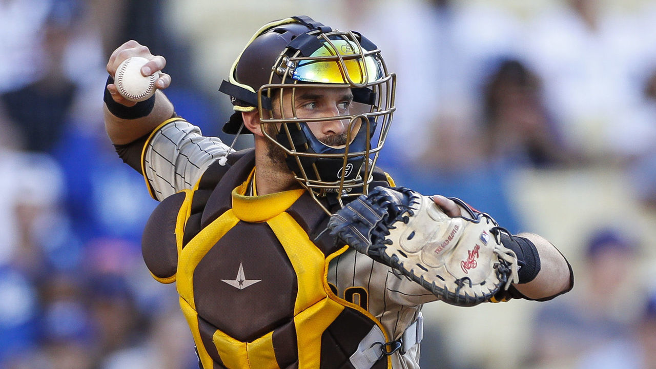 LOS ANGELES, CA - AUGUST 06: San Diego Padres catcher Austin Nola (26) throws the ball during a regular season game between the San Diego Padres and Los Angeles Dodgers on August 06, 2022, at Dodger Stadium in Los Angeles, CA.