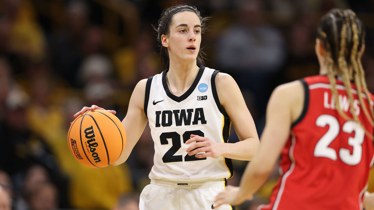 IOWA CITY, IA - MARCH 19: Caitlin Clark #22 of the Iowa Hawkeyes brings the ball up court in the second half against the Georgia Bulldogs during the second round of the 2023 NCAA Women's Basketball Tournament held at Carver-Hawkeye Arena on March 19, 2023 in Iowa City, Iowa.