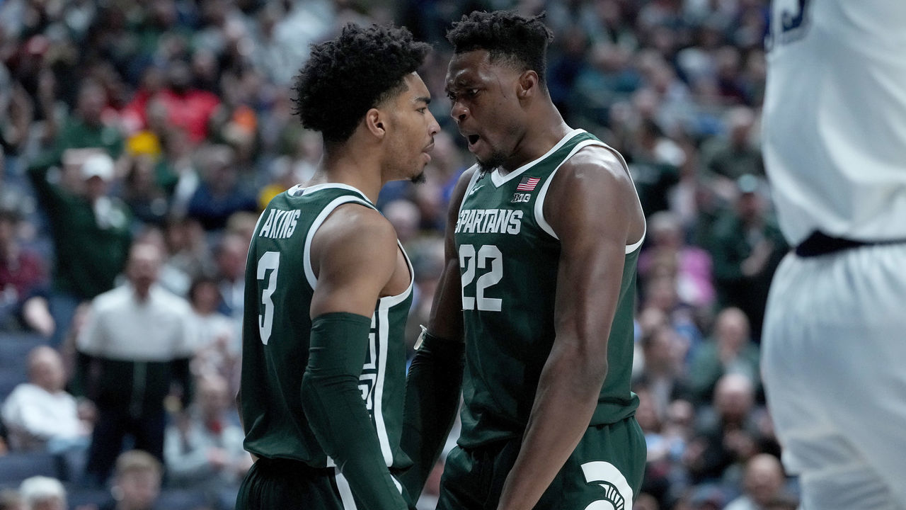 COLUMBUS, OHIO - MARCH 19: Mady Sissoko #22 and Jaden Akins #3 of the Michigan State Spartans celebrate a play against the Marquette Golden Eagles during the first half in the second round game of the NCAA Men's Basketball Tournament at Nationwide Arena on March 19, 2023 in Columbus, Ohio.