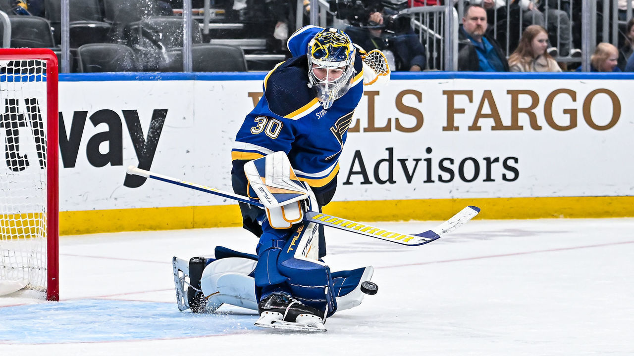 ST. LOUIS, MO - MARCH 19: St. Louis Blues goaltender Joel Hofer (30) makes a kick save during a game between the Winnipeg Jets and the St. Louis Blues on March 19 2023, at the Enterprise Center in St. Louis MO