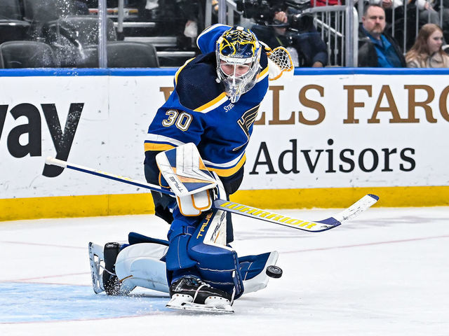 ST. LOUIS, MO - MARCH 19: St. Louis Blues goaltender Joel Hofer (30) makes a kick save during a game between the Winnipeg Jets and the St. Louis Blues on March 19 2023, at the Enterprise Center in St. Louis MO