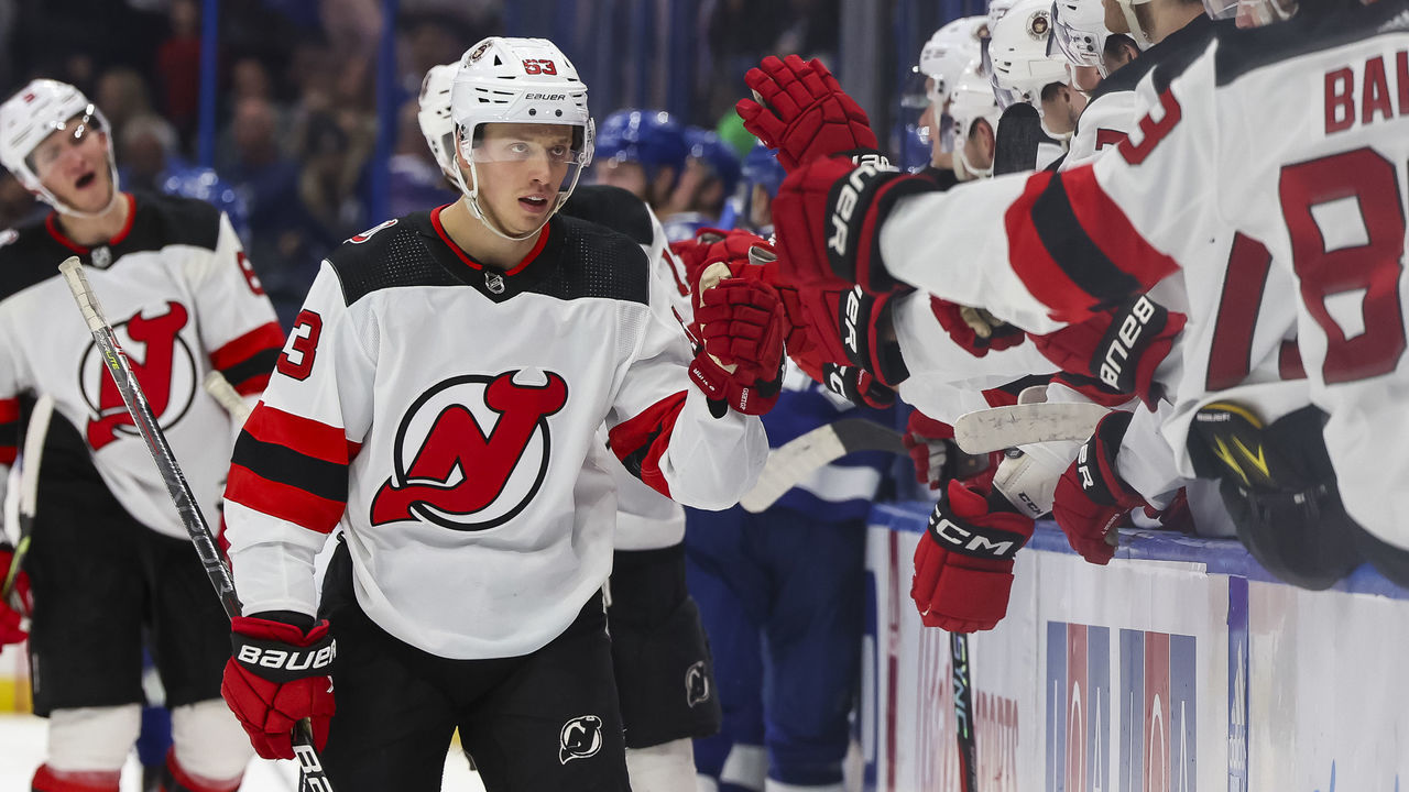 TAMPA, FL - MARCH 19: Jesper Bratt #63 of the New Jersey Devils celebrates his third goal of the game against the Tampa Bay Lightning during the third period at Amalie Arena on March 19, 2023 in Tampa, Florida.