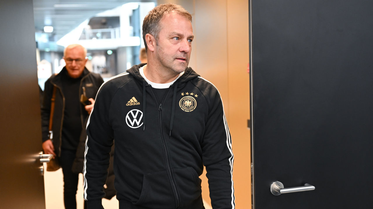 20 March 2023, Hesse, Frankfurt/Main: German national coach Hansi Flick arrives for a press conference of the German Football Association (DFB) at the DFB Campus. Photo: Arne Dedert/dpa - IMPORTANT NOTE: In accordance with the requirements of the DFL Deutsche Fußball Liga and the DFB Deutscher Fußball-Bund, it is prohibited to use or have used photographs taken in the stadium and/or of the match in the form of sequence pictures and/or video-like photo series.