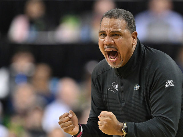 GREENSBORO, NC - MARCH 17: Head coach Ed Cooley of the Providence Friars cheers for his team against the Kentucky Wildcats during the first round of the 2023 NCAA Men's Basketball Tournament held at Greensboro Coliseum on March 17, 2023 in Greensboro, North Carolina.