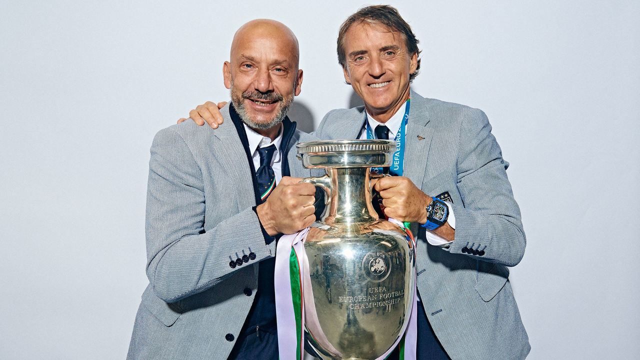 LONDON, ENGLAND - JULY 11: (EDITORS NOTE: Image has been digitally retouched) Gianluca Vialli, Delegation Chief of Italy and Roberto Mancini, Head Coach of Italy pose with The Henri Delaunay Trophy during an Italy Portrait Session following their side's victory in the UEFA Euro 2020 Championship Final between Italy and England at Wembley Stadium on July 11, 2021 in London, England.