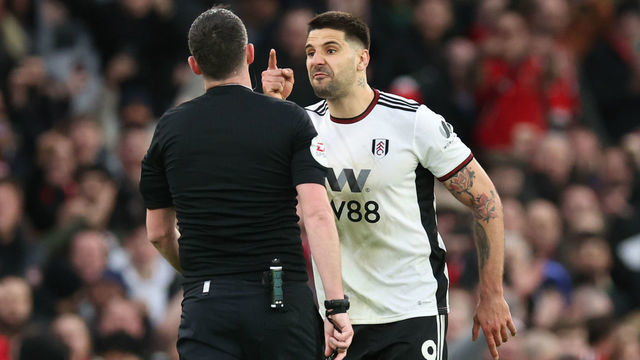 MANCHESTER, ENGLAND - MARCH 19: Aleksandar Mitrovic of Fulham receives a red card from Referee Chris Kavanagh during the Emirates FA Cup Quarter Final match between Manchester United and Fulham at Old Trafford on March 19, 2023 in Manchester, England.