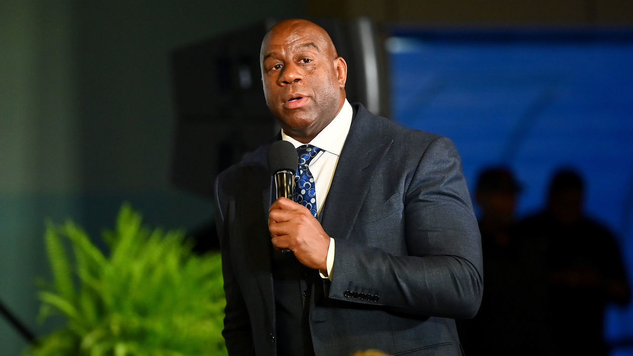 ATLANTA, GEORGIA - MARCH 17: Magic Johnson speaks during the 2023 International Poverty Forum at Delta Flight Museum on March 17, 2023 in Atlanta, Georgia.