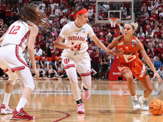 BLOOMINGTON, IN - MARCH 20: Hanna Cavinder #15 of the Miami Hurricanes drives to the basket against Sara Scalia #14 of the Indiana Hoosiers during the second round of the 2023 NCAA Women's Basketball Tournament held at Simon Skjodt Assembly Hall on March 20, 2023 in Bloomington, Indiana.
