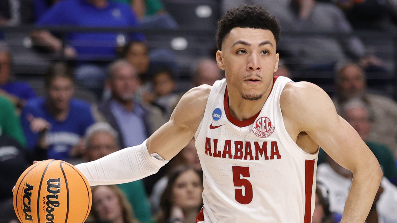 BIRMINGHAM, ALABAMA - MARCH 16: Jahvon Quinerly #5 of the Alabama Crimson Tide dribbles against the Texas A&M-CC Islandersduring the first half in the first round of the NCAA Men's Basketball Tournament at Legacy Arena at the BJCC on March 16, 2023 in Birmingham, Alabama.