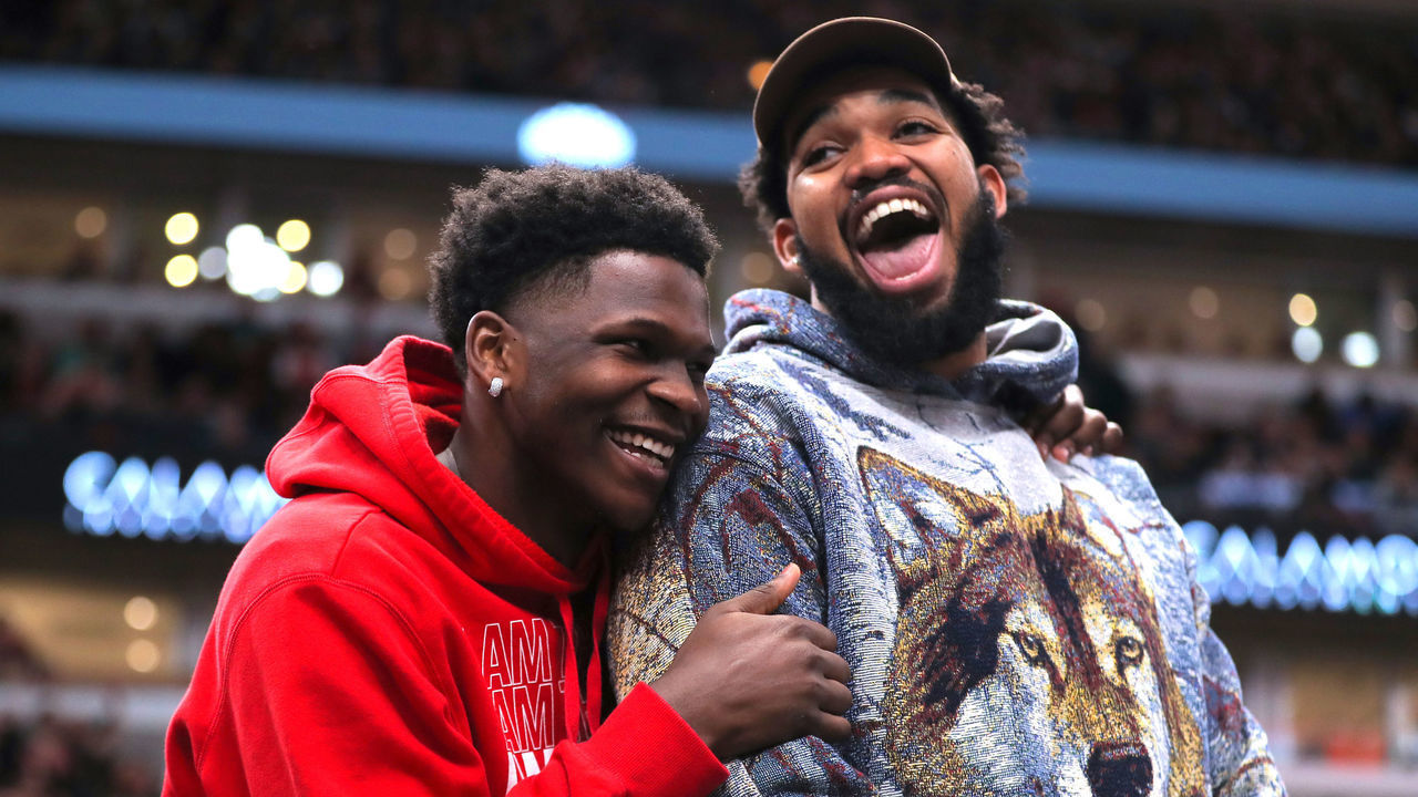 CHICAGO, IL - MARCH 17: Minnesota Timberwolves guard Anthony Edwards (1) and Minnesota Timberwolves center Karl-Anthony Towns (32) react on the bench during a NBA game between the Minnesota Timberwolves and the Chicago Bulls on March 17, 2023 at the United Center in Chicago, IL.