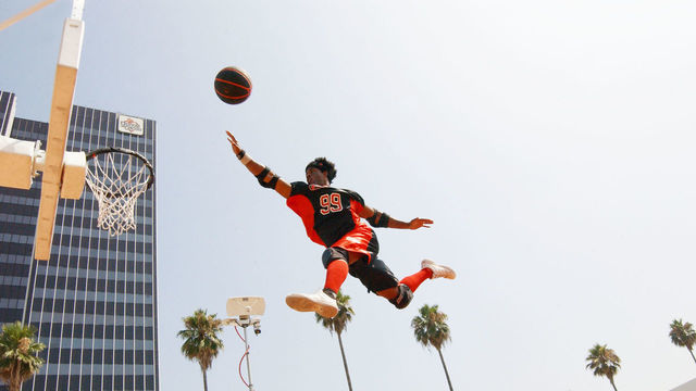 LOS ANGELES - JULY 30: Athlete LaMonica Garrett demonstrates the new team action sport "Slamball" at a live exhibition at Nick on Sunset on July 30, 2002 in Los Angeles, California. The new sport debuts Saturday August 3, 2002 on TNN.