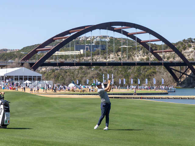 AUSTIN, TX - MARCH 26: Seamus Power hits his approach shot on the 13th hole with the Pennybacker Bridge in the background during the Quarterfinals of the PGA - World Golf Championships-Dell Technologies Match Play on March 26, 2022, at Austin County Club in Austin, TX.