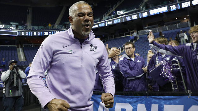 GREENSBORO, NORTH CAROLINA - MARCH 19: Head coach Jerome Tang of the Kansas State Wildcats celebrates after defeating the Kentucky Wildcats 75-69 in the second round of the NCAA Men's Basketball Tournament at The Fieldhouse at Greensboro Coliseum on March 19, 2023 in Greensboro, North Carolina.