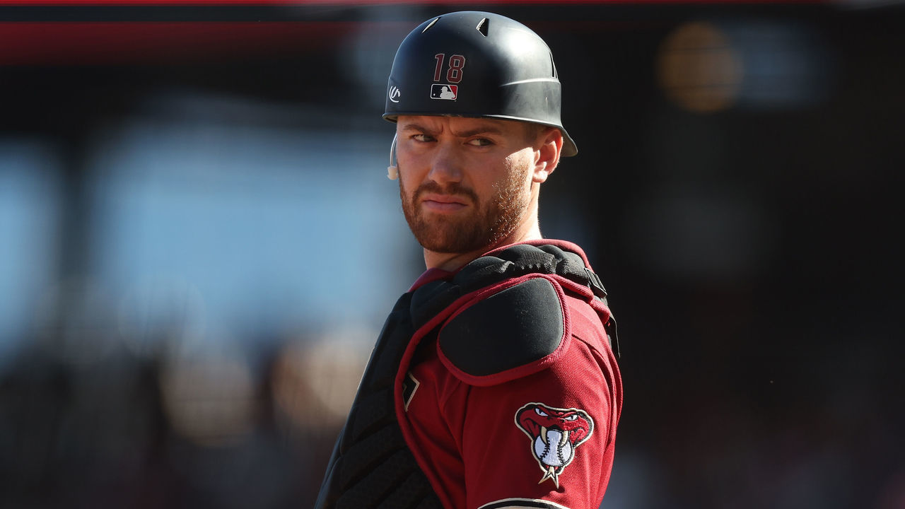 SAN FRANCISCO, CALIFORNIA - OCTOBER 02: Catcher Carson Kelly #18 of the Arizona Diamondbacks looks on during the game against the San Francisco Giants at Oracle Park on October 02, 2022 in San Francisco, California.