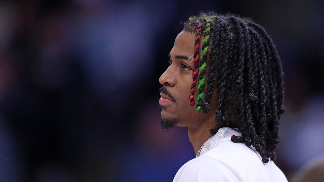 MEMPHIS, TENNESSEE - MARCH 20: Ja Morant #12 of the Memphis Grizzlies looks on during the second half against the Dallas Mavericks at FedExForum on March 20, 2023 in Memphis, Tennessee.