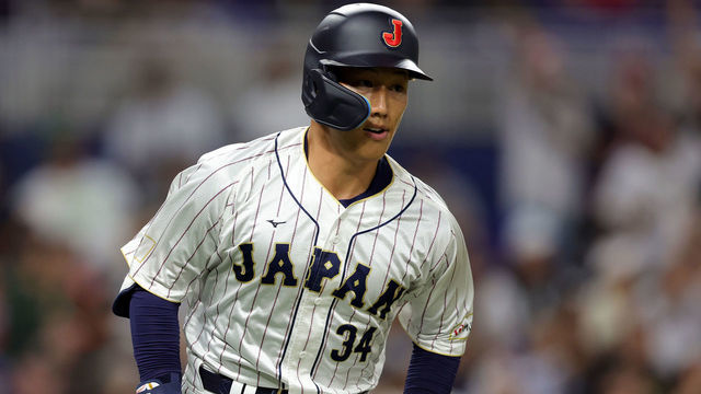 MIAMI, FLORIDA - MARCH 20: Masataka Yoshida #34 of Team Japan runs to first base after hitting a single against Team Mexico during the second inning during the World Baseball Classic Semifinals at loanDepot park on March 20, 2023 in Miami, Florida.
