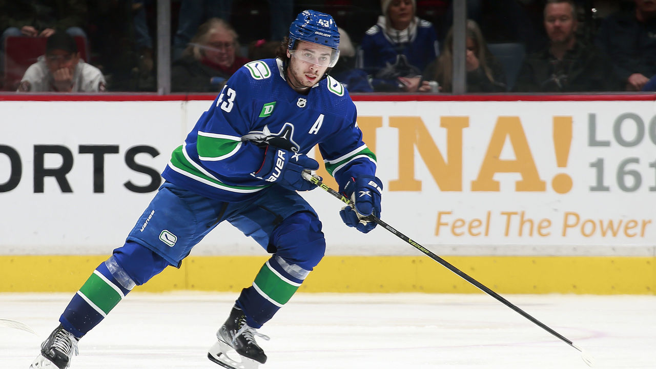 VANCOUVER, CANADA - MARCH 11: Quinn Hughes #43 of the Vancouver Canucks skates up ice during their NHL game against the Ottawa Senators at Rogers Arena March 11, 2023 in Vancouver, British Columbia, Canada.