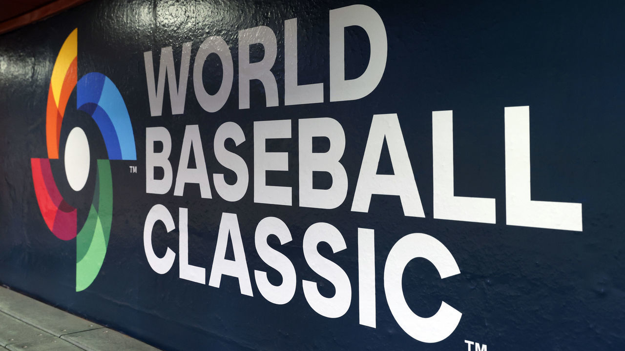 PHOENIX, ARIZONA - MARCH 10: The World Baseball Classic logo is seen on a dugout wall before the start of the World Baseball Classic at Chase Field on March 10, 2023 in Phoenix, Arizona.