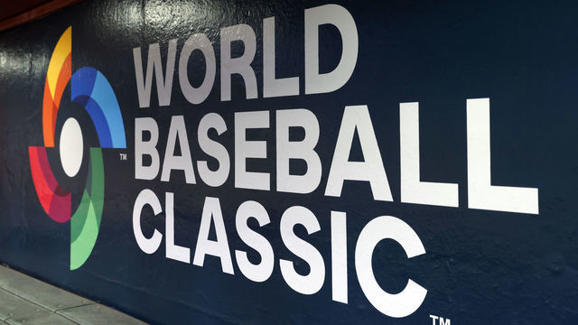 PHOENIX, ARIZONA - MARCH 10: The World Baseball Classic logo is seen on a dugout wall before the start of the World Baseball Classic at Chase Field on March 10, 2023 in Phoenix, Arizona.