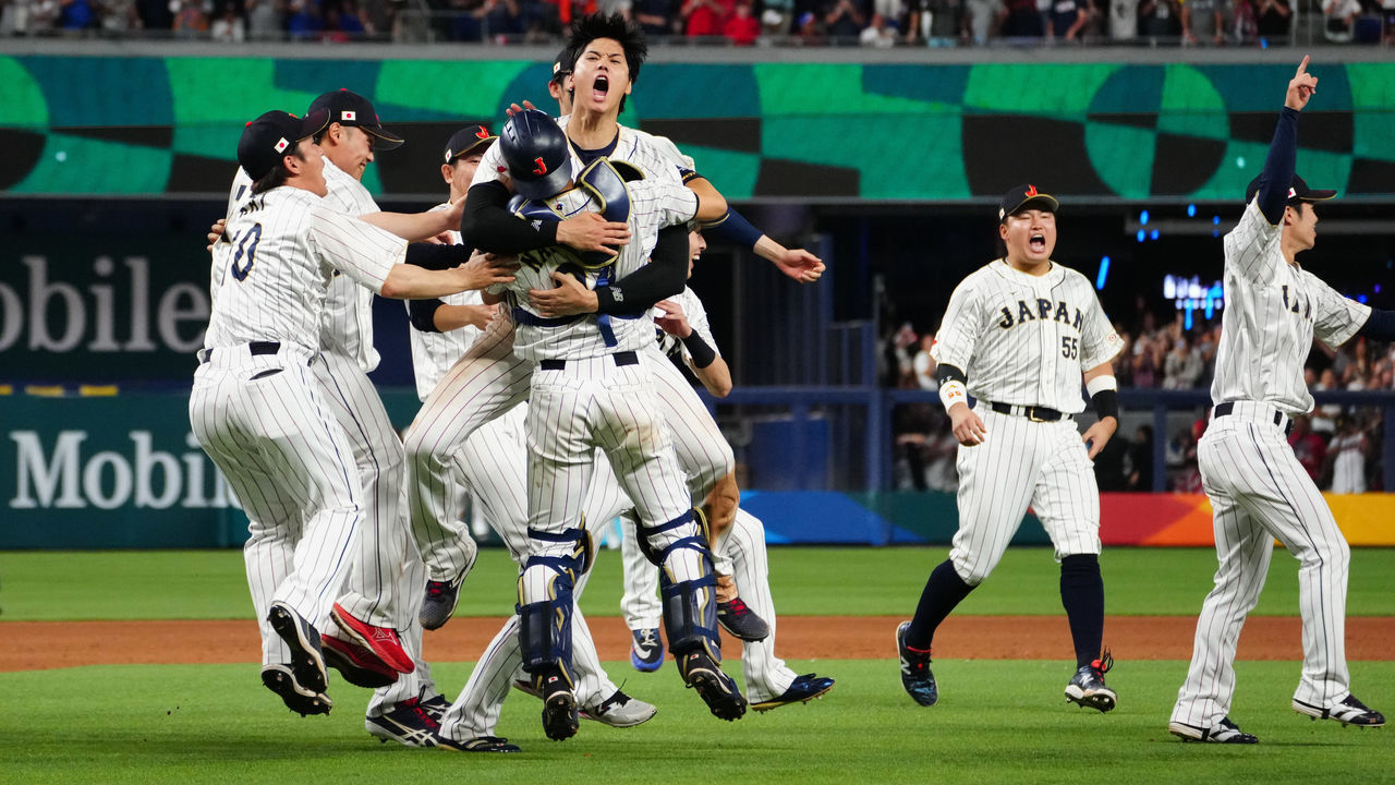 MIAMI, FL - MARCH 21: Shohei Ohtani #16 of Team Japan reacts with teammates after winning the 2023 World Baseball Classic Championship over Team USA at loanDepot Park on Tuesday, March 21, 2023 in Miami, Florida.