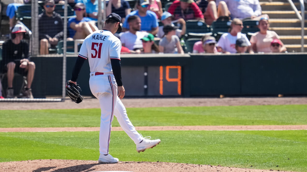 FORT MYERS, FL- MARCH 11: Tyler Mahle #51 of the Minnesota Twins looks on in front of the pitch clock during a spring training game against the Boston Red Sox on March 11, 2023 at the Hammond Stadium in Fort Myers, Florida.