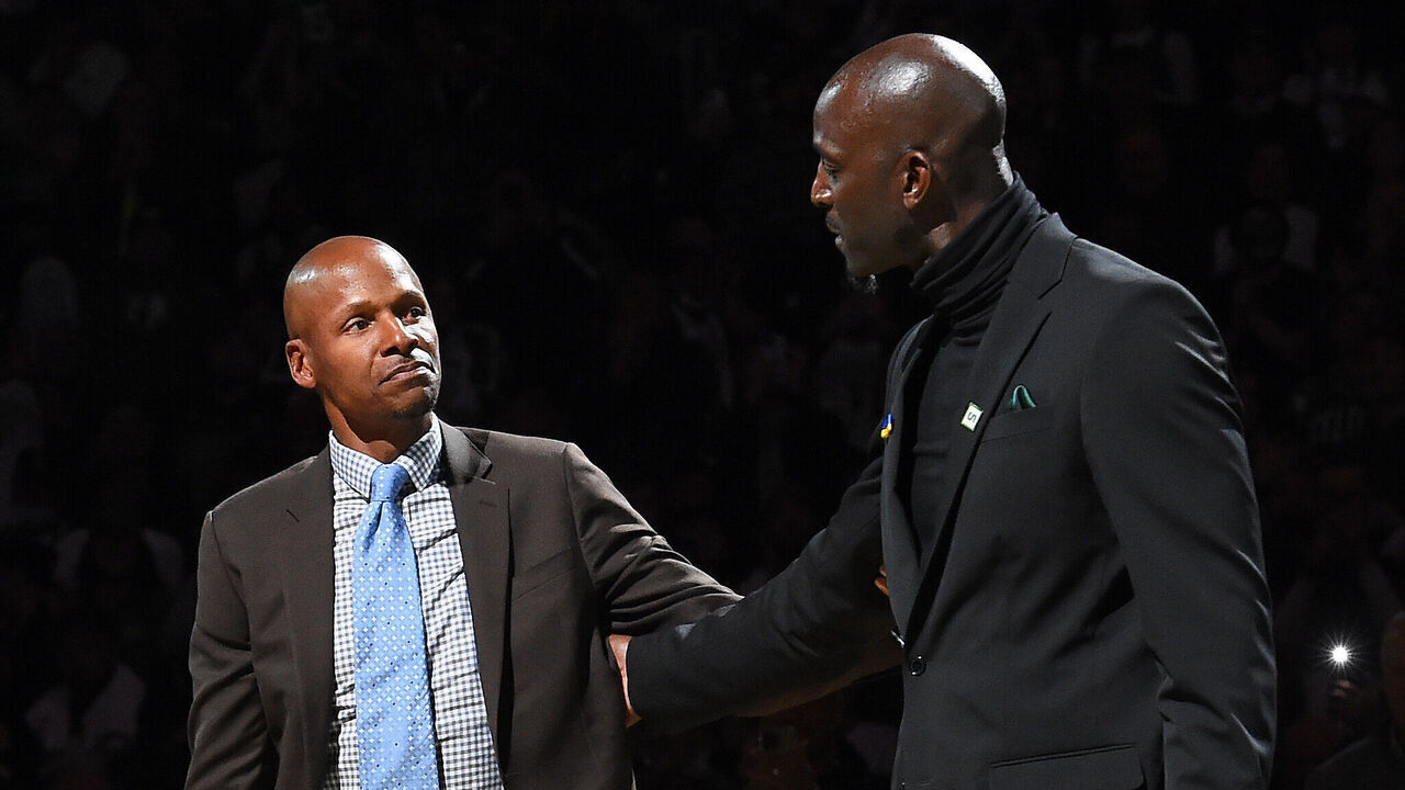 BOSTON, MA - MARCH 13: Former Boston Celtics player, Ray Allen hugs Kevin Garnett during his number retirement ceremony on March 13, 2022 at the TD Garden in Boston, Massachusetts. Mandatory Copyright Notice: Copyright 2022 NBAE