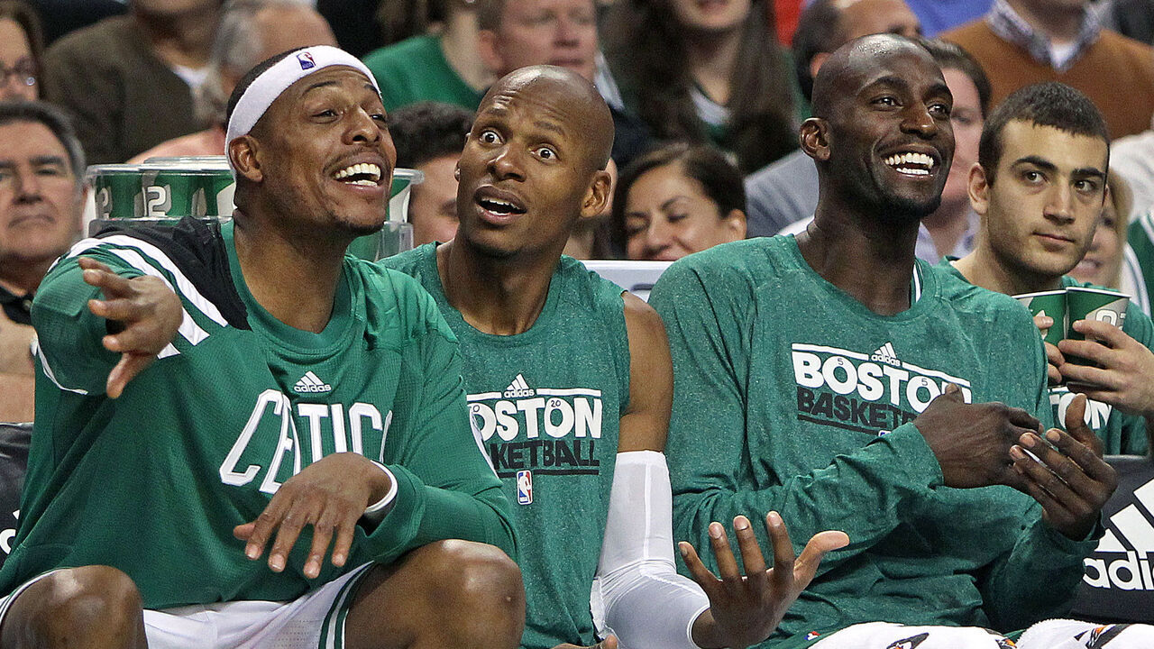 BOSTON - DECEMBER 30: The Celtics finally broke into the win column tonight, which allowed, left to right, Paul Pierce, Ray Allen and Kevin Garnett to have some fun on the bench during the fourth quarter. The Boston Celtics hosted the Detroit Pistons in an NBA regular season game at the TD Garden, the team's home opener.